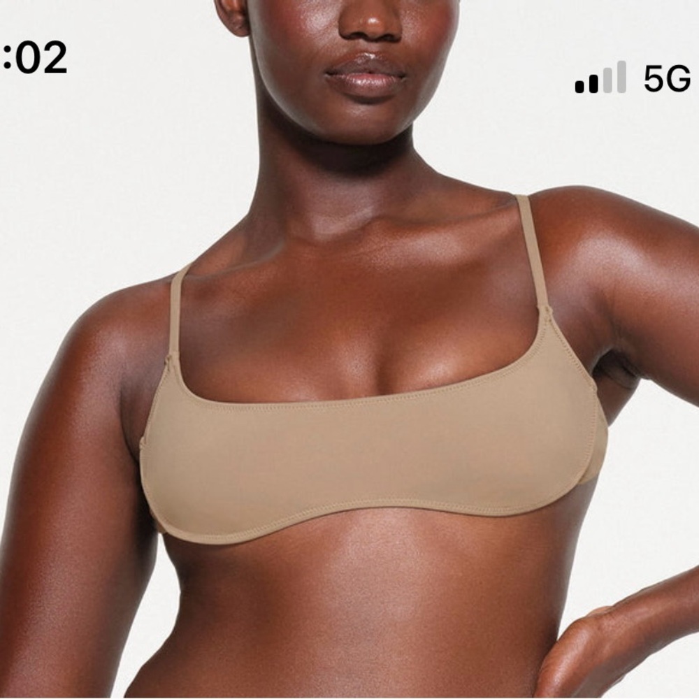 Skims swim suit. Top Large Bottom Medium.
